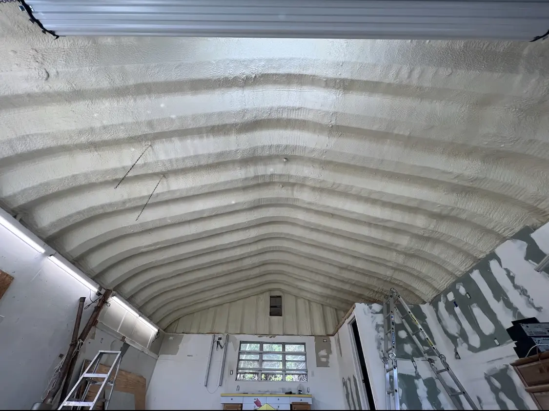 Spray polyurethane foam applied to the underside of a metal roof deck in Rio Rancho